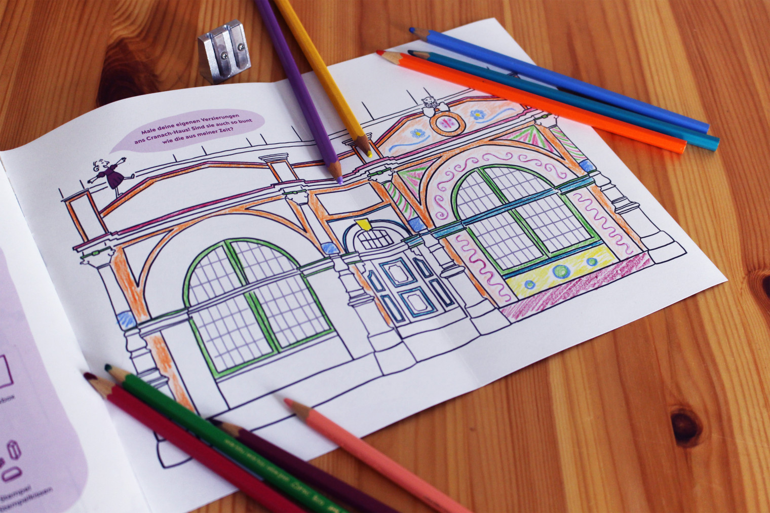 Ausgemaltes Ausmalbild mit dem Cranach-Haus als Motiv.